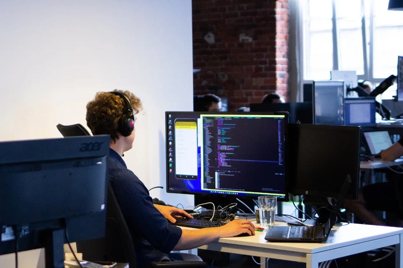 Developer-working-on-SaMD-Revolve-Healthcare Developer-working-on-SaMD-Revolve-Healthcare